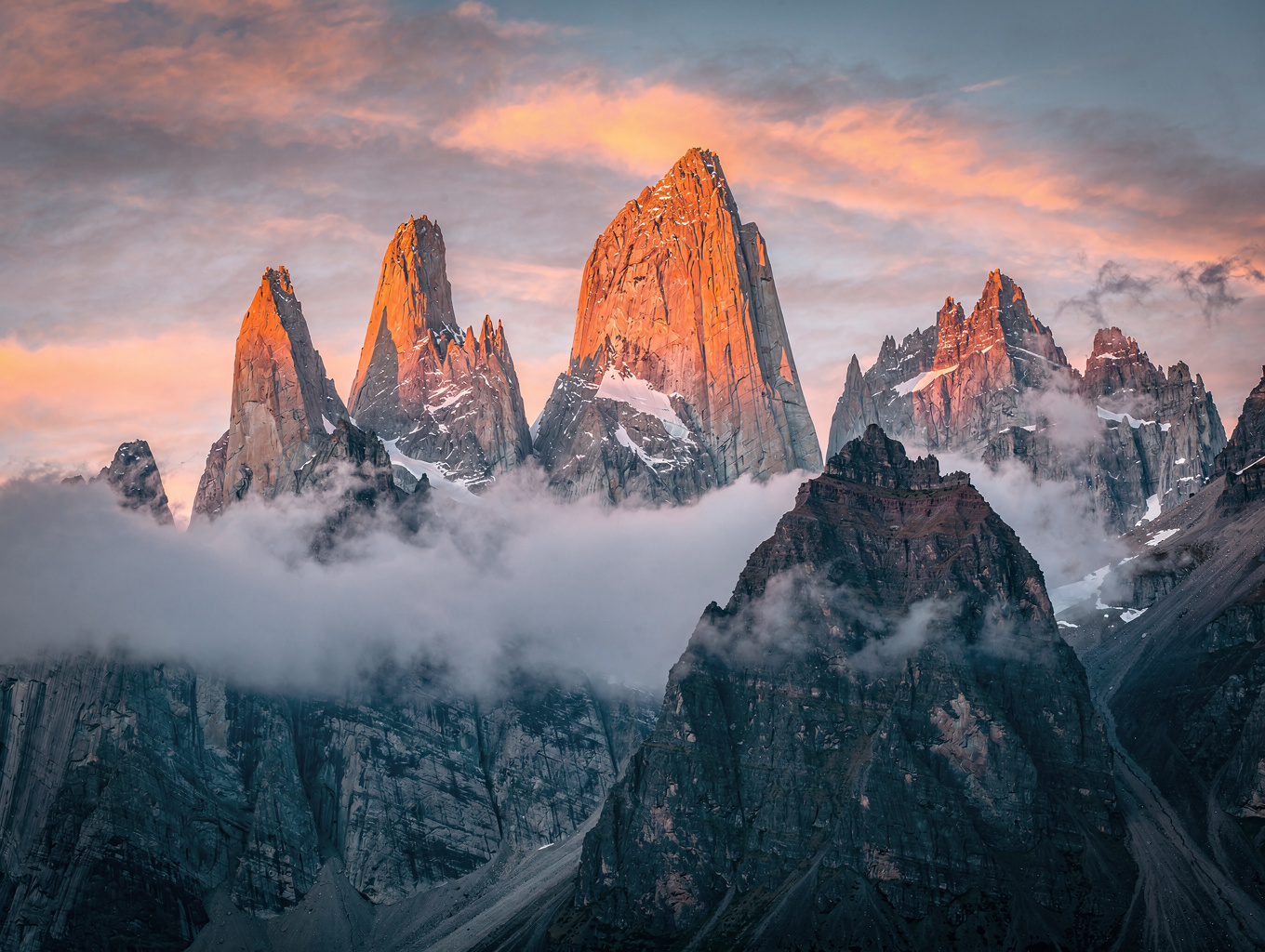 Sunrise illumination striking the granite spires of Patagonia
